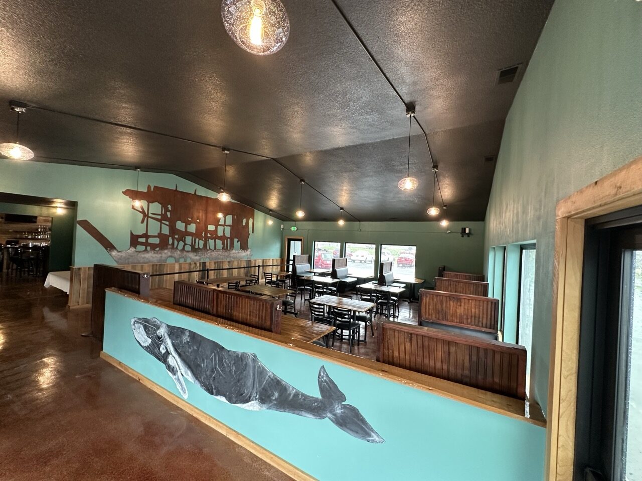 Battery 245 dining room with handcrafted whale mural and shipwreck art